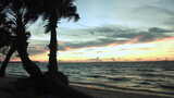 日落时佛罗里达州巴伊亚海滩美丽海滩背景的基座照片高清在线视频素材下载