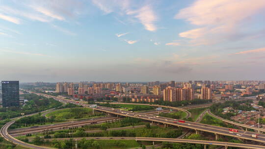北京远通立交桥车流日转夜下摇镜头延时摄影