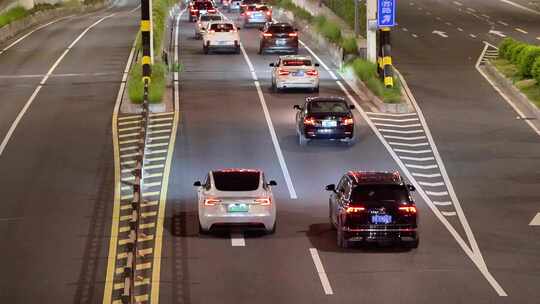 夜晚快速路隧道口车流马路行车亮化