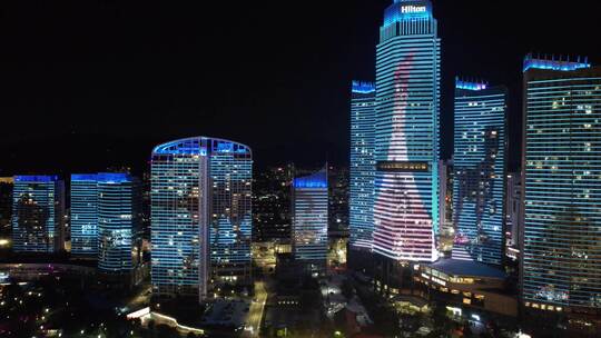 山东烟台滨海广场世贸大厦夜景灯光秀航拍视频素材模板下载