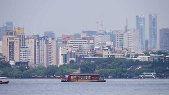 江南西湖 游船 划船 旅游 城市建筑 周末