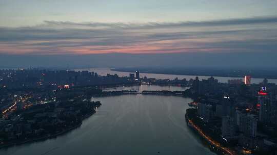 晚霞中的江西九江城市夜景航拍