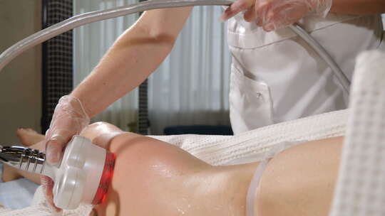 美容诊所女性腿部和臀部皮肤收紧手术视频素材模板下载