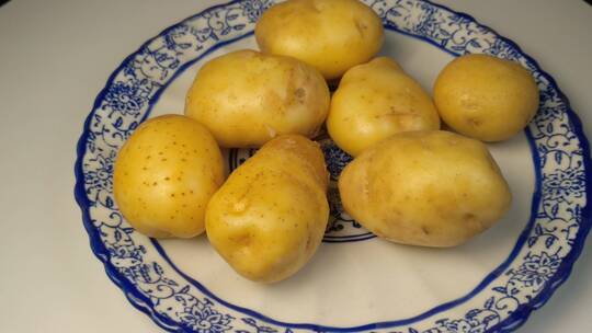 土豆特写马铃薯洋芋有机蔬菜旋转