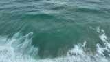 泰国普吉岛海水冲刷沙滩溅起浪花特写镜头高清在线视频素材下载