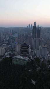 竖版航拍贵阳东山寺晚霞夜幕降临