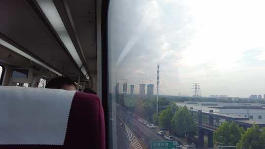 长沙高铁西至黄花机场磁浮列车车厢车窗拍摄视频素材模板下载