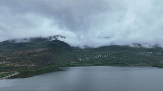 航拍云南丽江文笔水库文笔山云雾山水