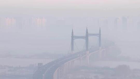 哈尔滨阳明滩大桥雪景航拍日出