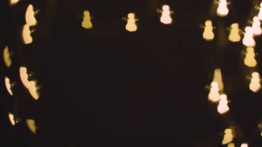 雪人形状圣诞灯的背景视频素材模板下载