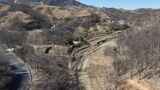 航拍蜿蜒盘旋的山间公路高清在线视频素材下载