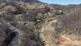 航拍蜿蜒盘旋的山间公路高清在线视频素材下载