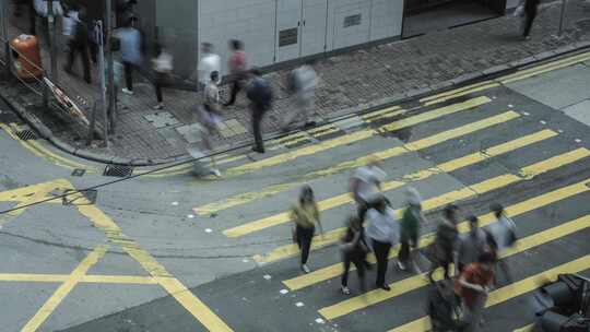 香港街头斑马线过街行人与车流延时4k视频素材模板下载