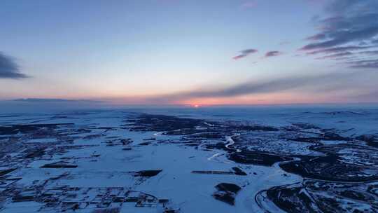 海拉尔河湿地冬天雪景日落晚霞