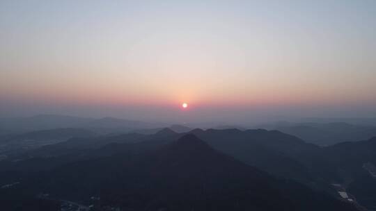 航拍连绵起伏山川日落晚霞