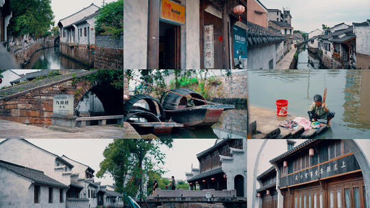 江南水乡古镇风光航拍小桥流水乌篷船老店高清在线视频素材下载