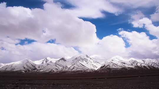 玉珠峰雪山蓝天白云延时摄影