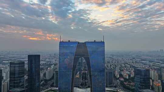 江苏苏州金鸡湖东方之门CBD日落夜景航拍