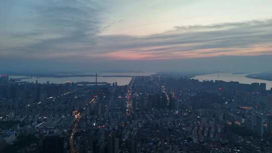 晚霞中的江西九江城市夜景航拍