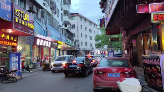 城市街道马路建筑步行街街商铺菜市场人流