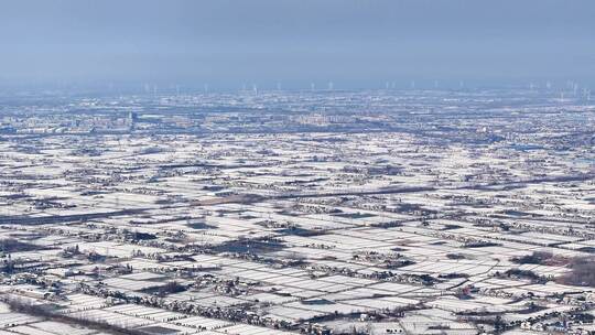 航拍乡镇雪景学校建筑田地大桥别墅河流房屋