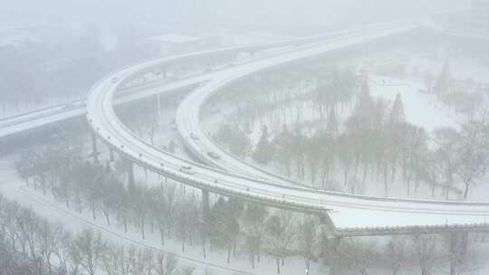 城市雪景道路航拍视频素材模板下载