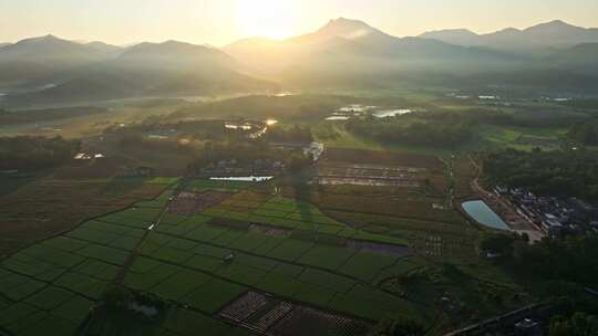 中国侨乡广东台山乡村稻田山脉山峰日出航拍