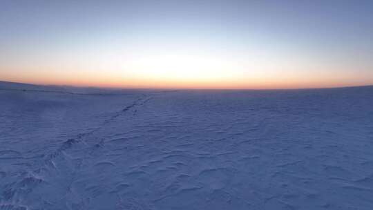航拍内蒙古冬天自然风光草原雪景日落风景