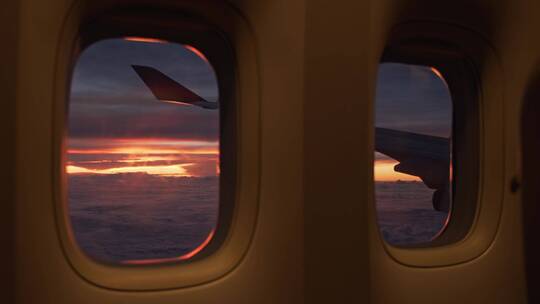 机窗外的夕阳景色视频素材模板下载