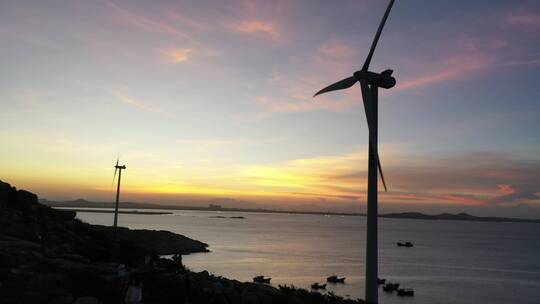 唯美风车海边傍晚夕阳晚霞泉州风车岛风车视频素材模板下载