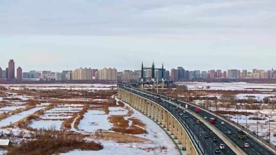 中国黑龙江哈尔滨阳明滩大桥雪景航拍