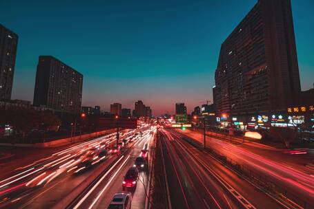 杭州城市交通日转夜车轨延时摄影
