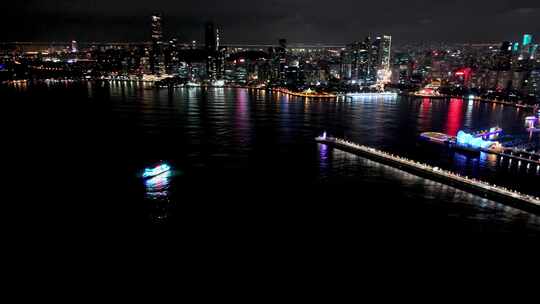 中国山东青岛城市夜景灯光秀航拍城市鸟瞰