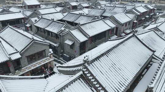 4K临沂沂州里雪景古风屋顶积雪航拍