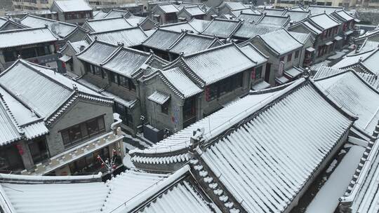 4K临沂沂州里雪景古风屋顶积雪航拍视频素材模板下载