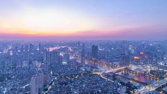 广州珠江岸城市建筑群夜景航拍延时风光
