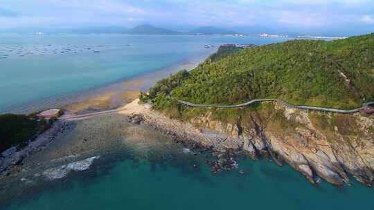 航拍海南三亚西岛海洋文化旅游区海浪礁石