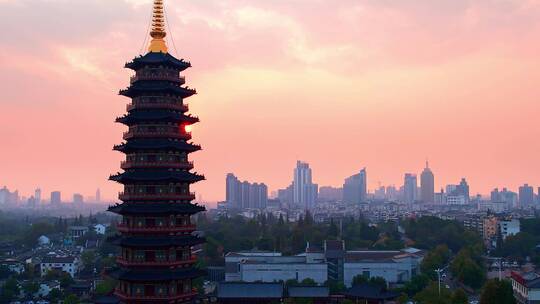 航拍夕阳金华老城区地标古建筑万佛塔