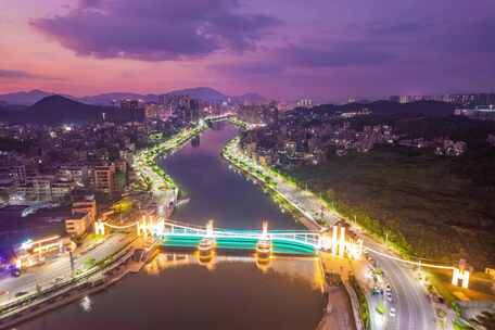 信宜一河两岸含章桥日落夜景