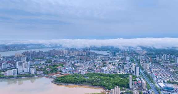 九江市春季雨后江南烟云及城市风景航拍延时