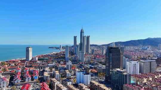 航拍山东烟台滨海城市建筑海岸线风光全景