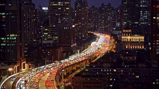 中国上海延安高架夜晚城市道路汽车交通景观