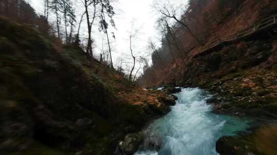 FPV航拍山间小溪溪流瀑布峡谷自然风景