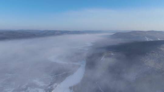 延时航拍寒冬林海雪原冻雾