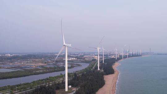 海边沙滩风力发电大风车