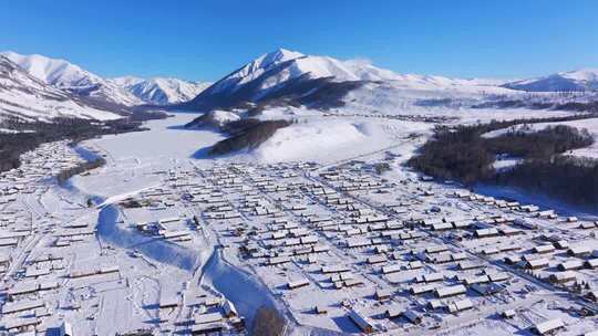 新疆阿勒泰地区禾木村雪景航拍