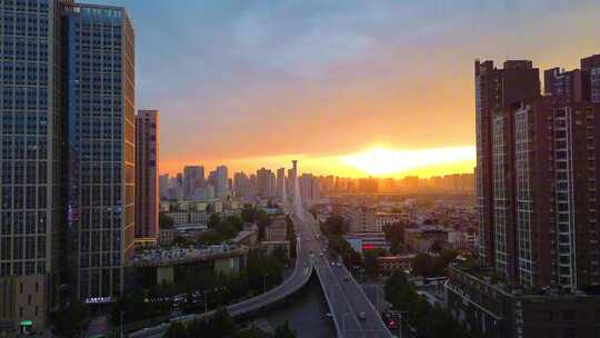 河南郑州二七区城市天际线夕阳航拍