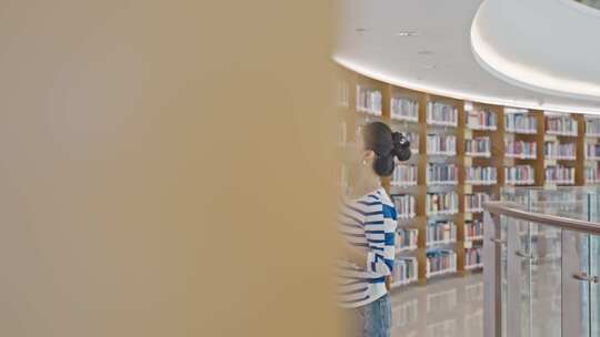 美女图书馆看书翻书工作查阅资料视频素材模板下载