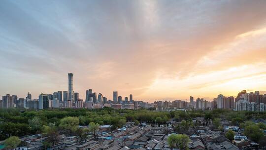 北京东四环居民区和国贸CBD建筑群日落延时