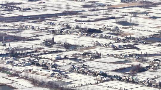 航拍乡镇雪景学校建筑田地大桥别墅河流房屋